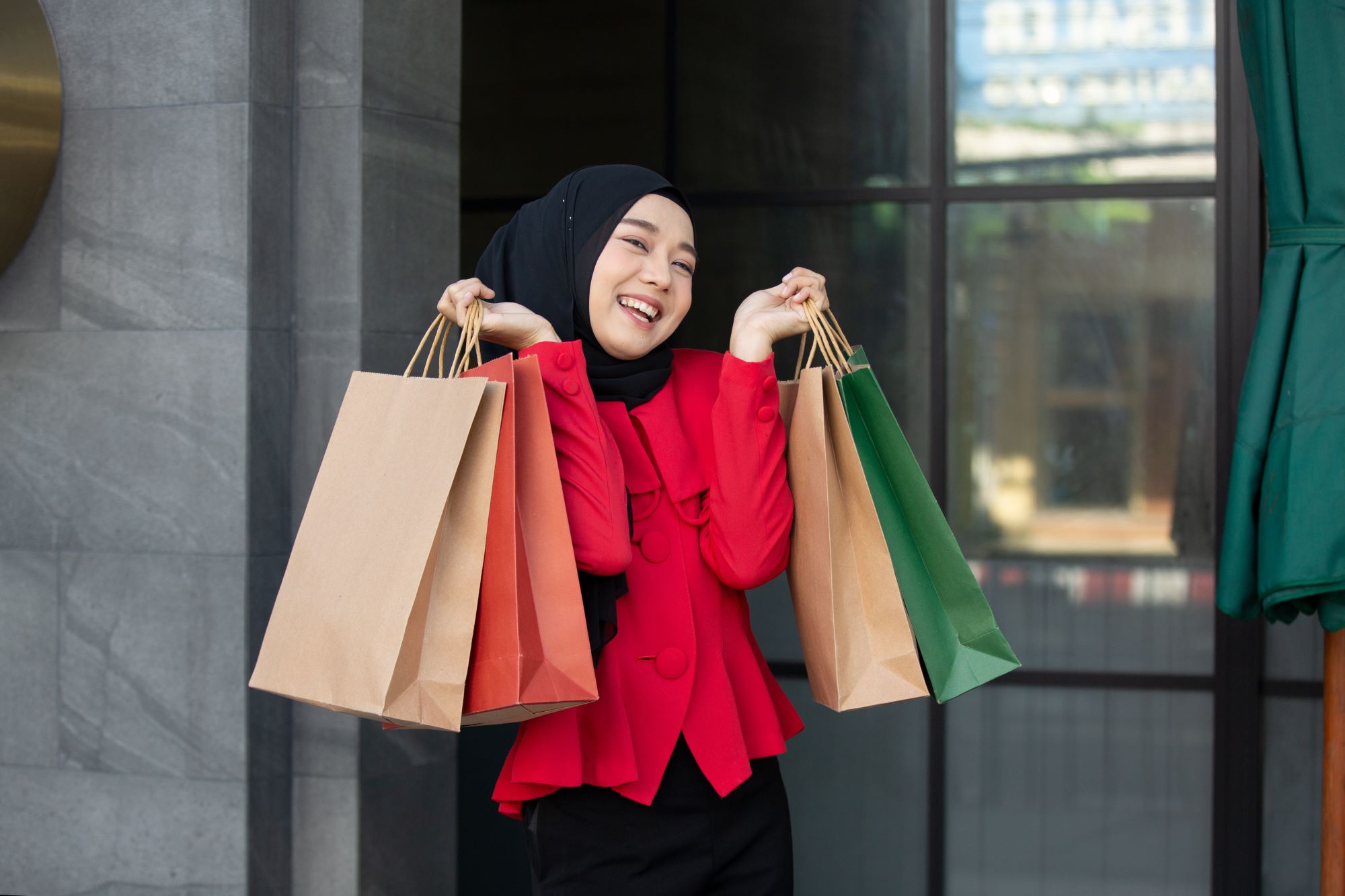 a-Malay-woman-with-plenty-of-shopping-bags-in-hand